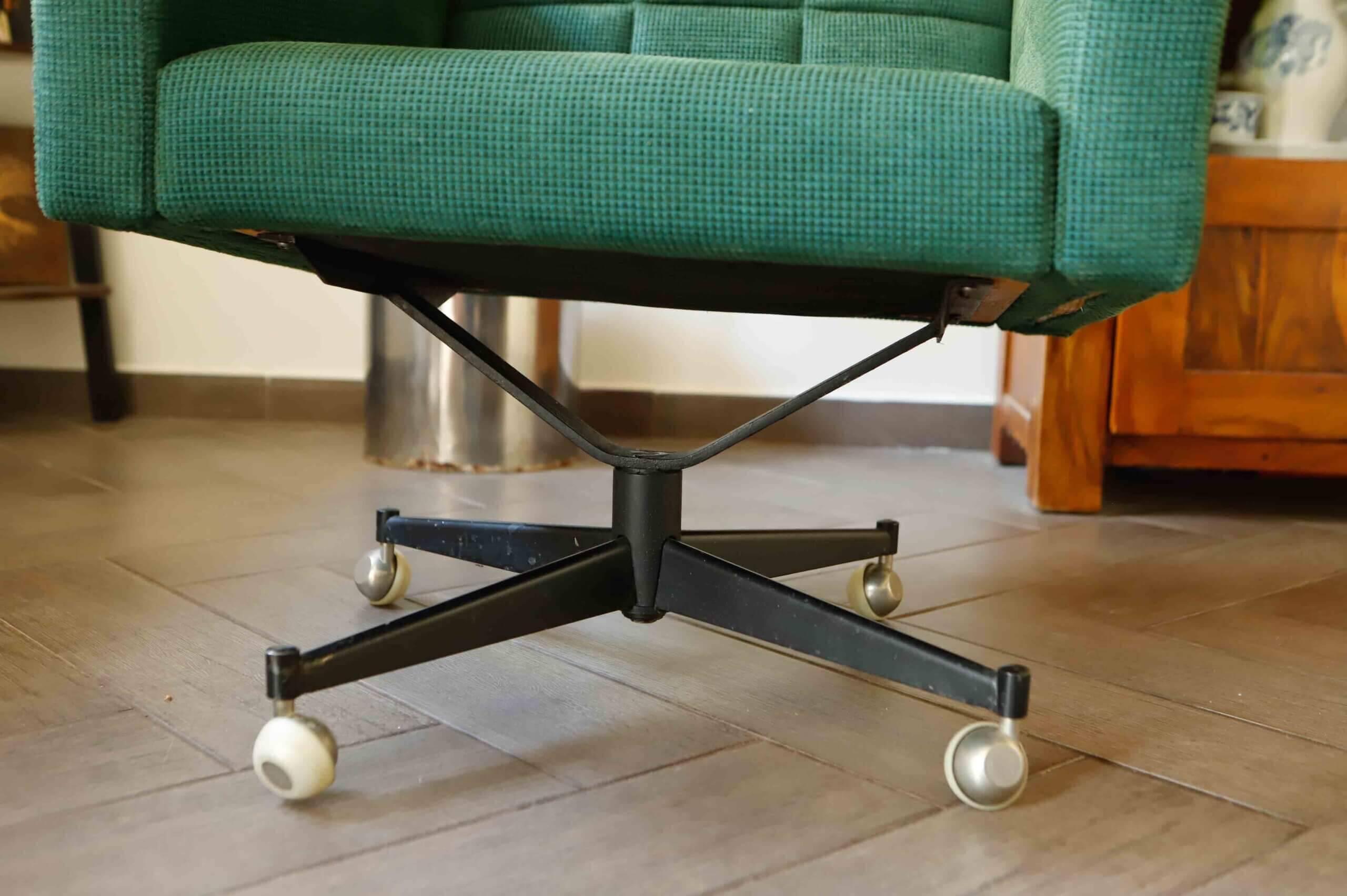 Pair of retro swivel chairs on casters