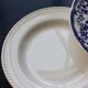 4 mismatched vintage flat plates in blue and white earthenware - Bristol Lot