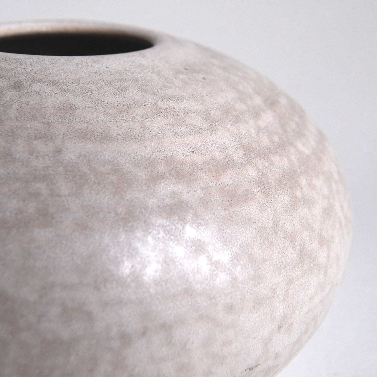 Vintage white ceramic ball vase