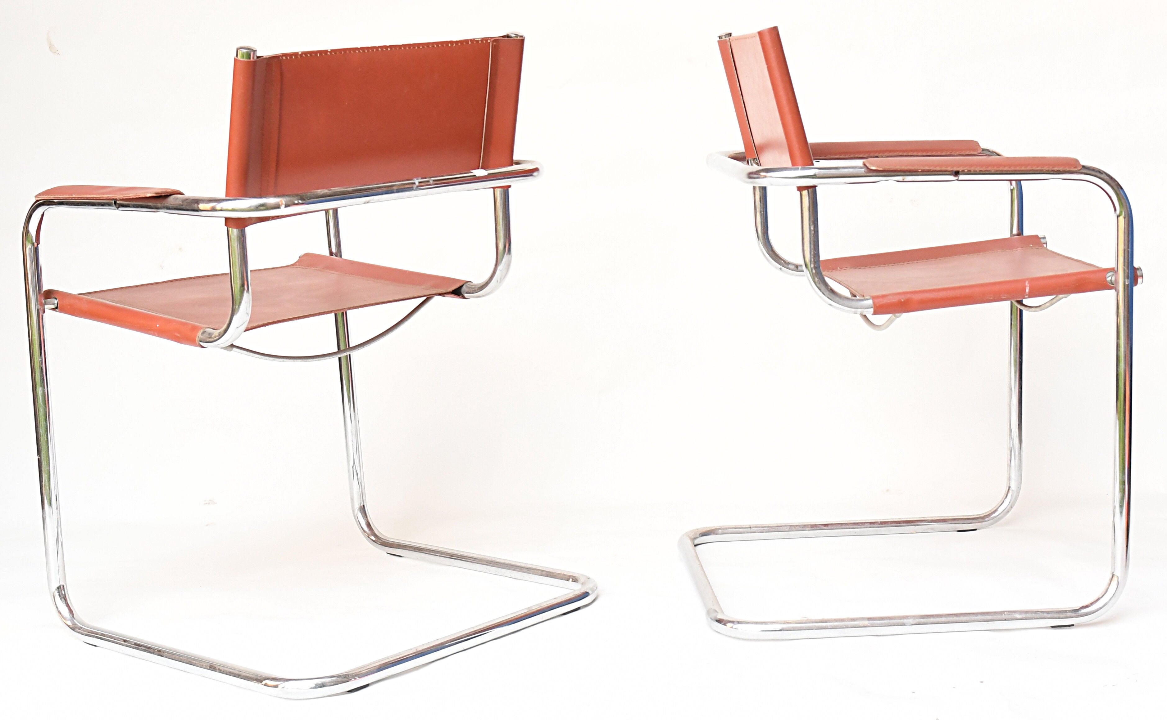 Pair of armchairs in brown saddle leather