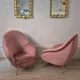 An elegant pair of armchairs with brass legs, Italy from the mid-20th century.