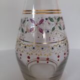 Antique golden carafe with colorful patterns