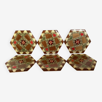 Six varnished wood marquetry coasters