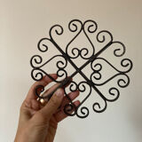 Underside of wrought iron antique metal