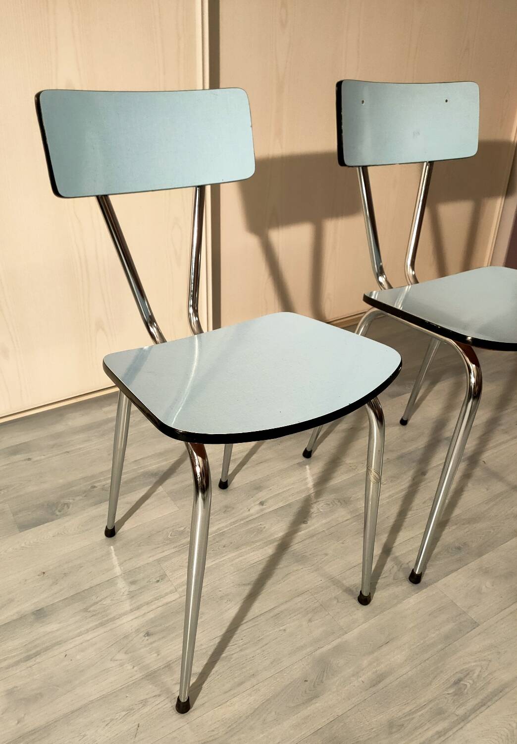 Pair of blue formica chairs