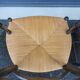 Pair of blackened wood armchairs
