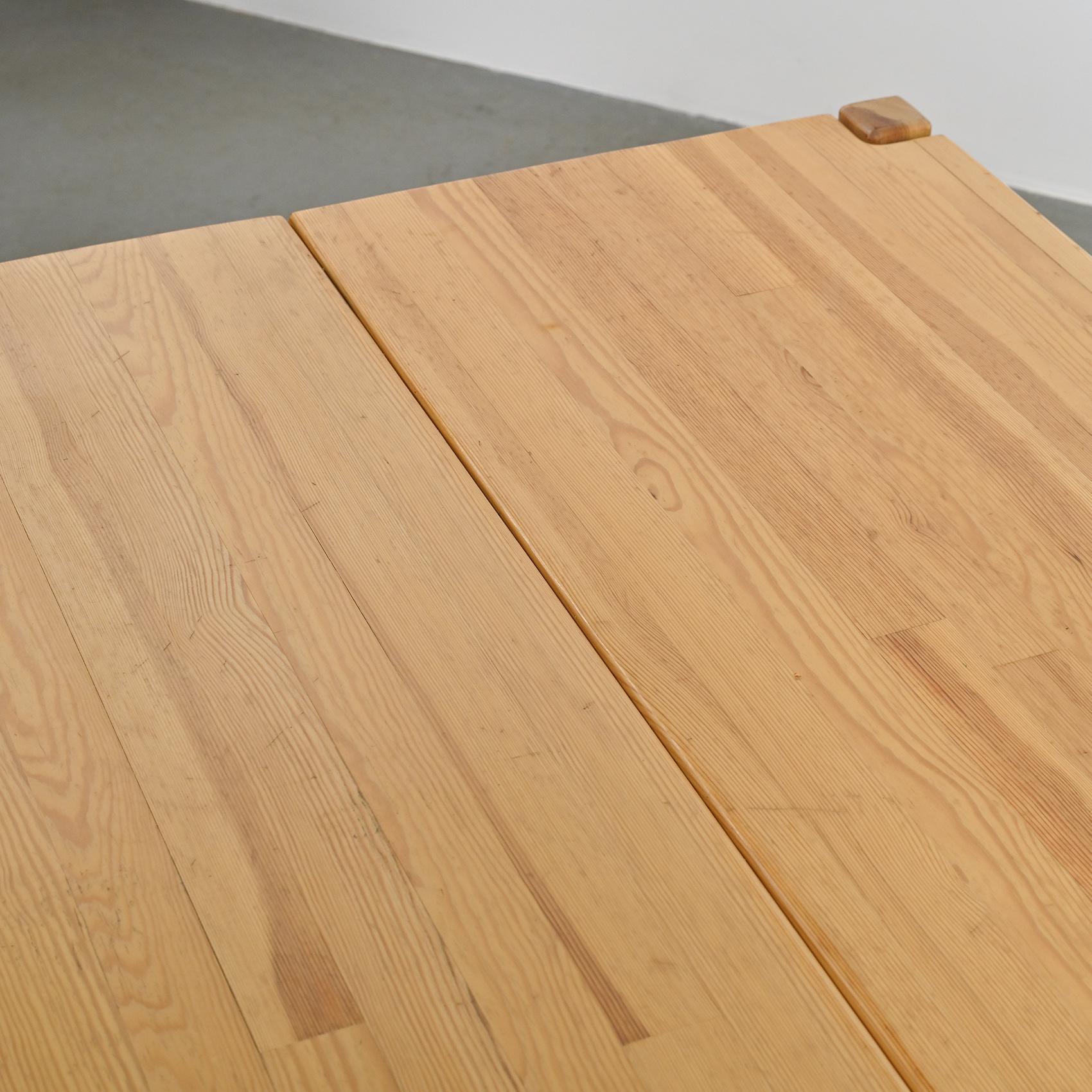 Table and two benches set in solid elm, France, circa 1980