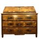 Commode scribanne from the Louis XVI period in walnut burl with marquetry decoration.