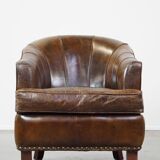 Stylish armchair made of cowhide leather with a unique design and beautiful finish