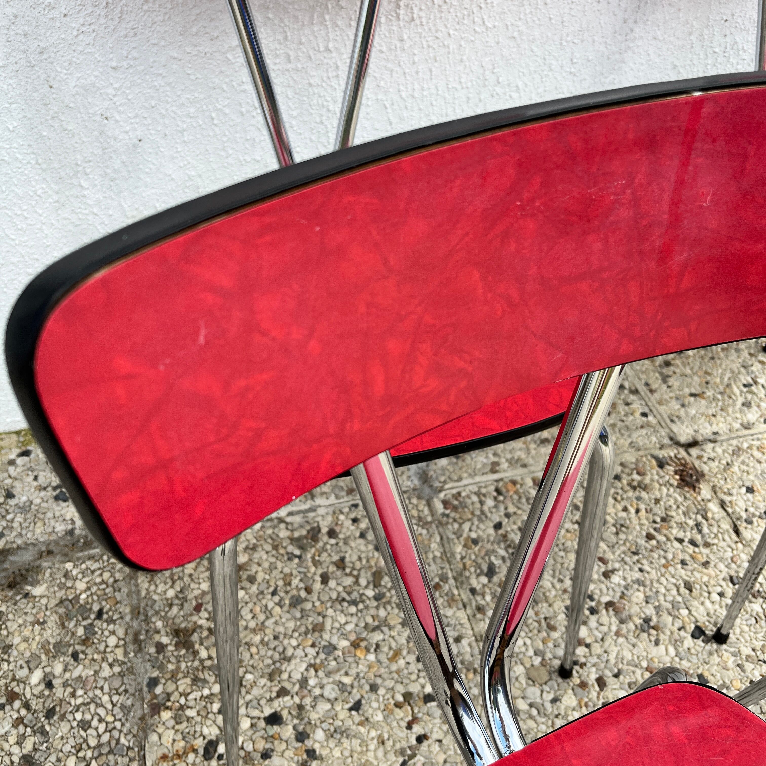 Chairs in formica red foot compass