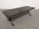 Brutalist coffee table in natural stone and wrought iron, France circa 1960.