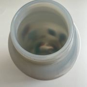 Blown opaline glass vase with coloured inclusions
