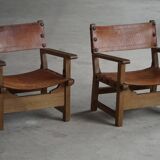 Pair of Spanish brutalist armchairs from the 1960s, wood and leather.