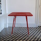 Red metal folding table Malaval type