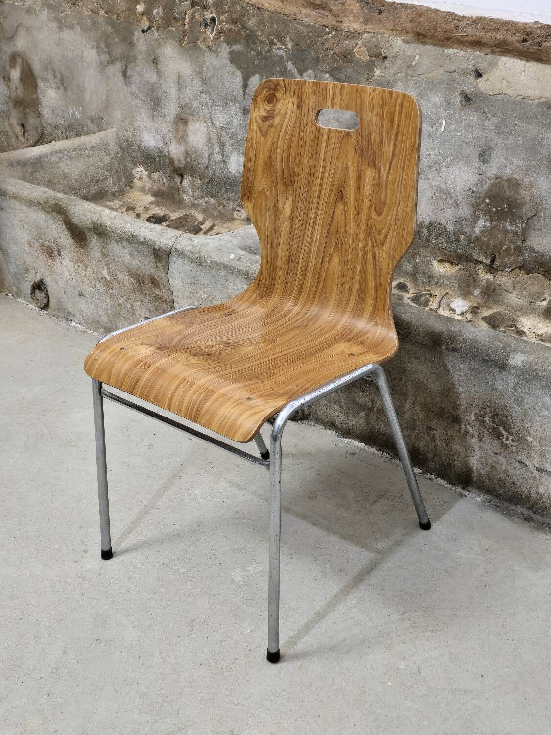 1960s chair in curved plywood on stainless steel base