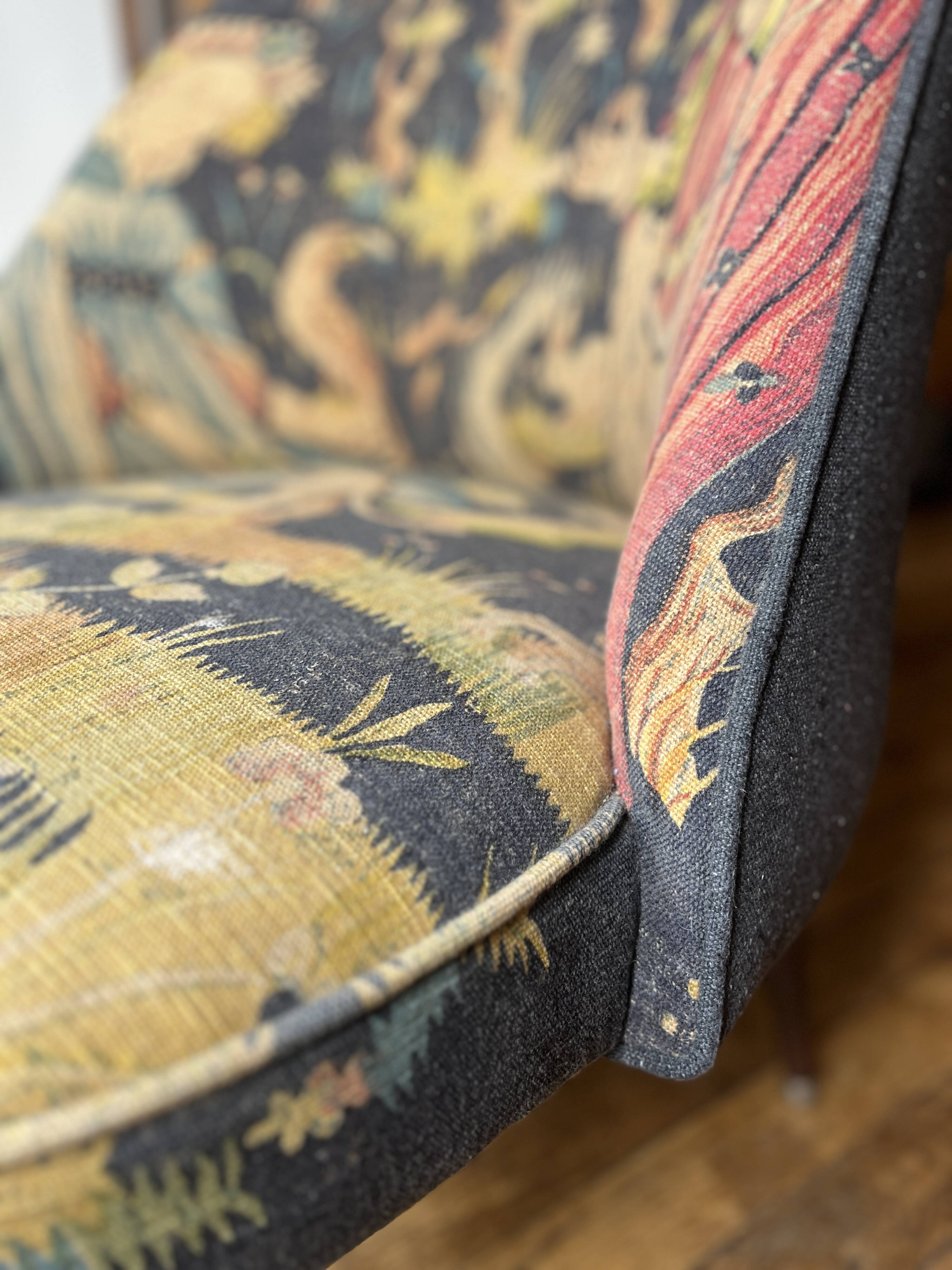 J. Tenreiro, Brazil. Concha armchair with tapered legs, Cluny tapestry 1400.