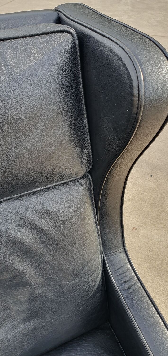 Vintage black leather scandinavian wingback chair Lulu Stouby