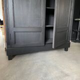 Large black wooden wardrobe