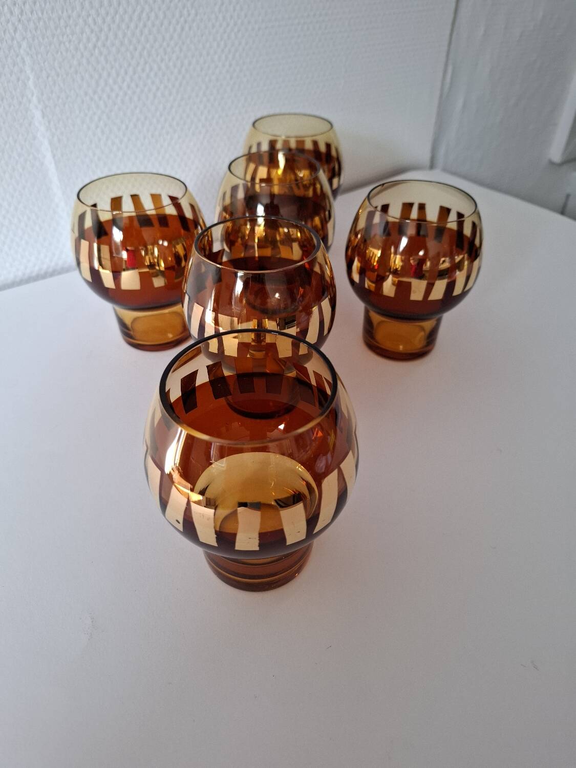 Carafe and its amber/golden glasses from the 70s.