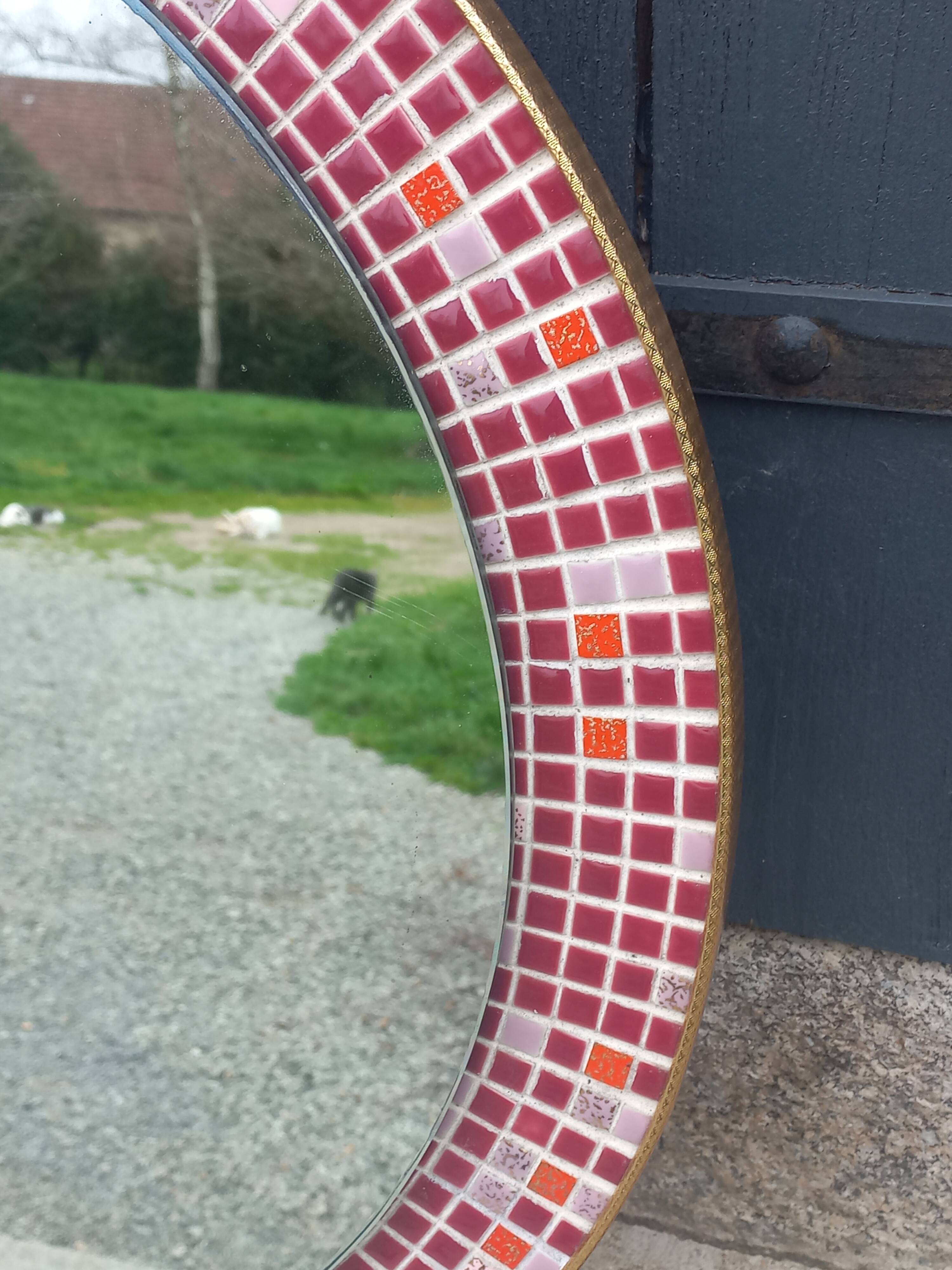 Vintage ceramic mirror from the 1960s.