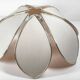 1970s ceiling light with floral design, light beige shade with gold finish.