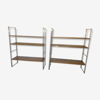 set of two 1960 vintage metal thong shelves.