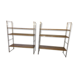 set of two 1960 vintage metal thong shelves.