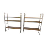 set of two 1960 vintage metal thong shelves.
