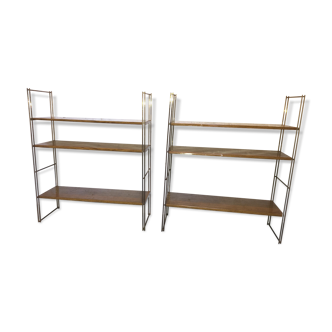 set of two 1960 vintage metal thong shelves.