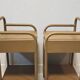 Old ochre metal bedside tables from a boarding school.