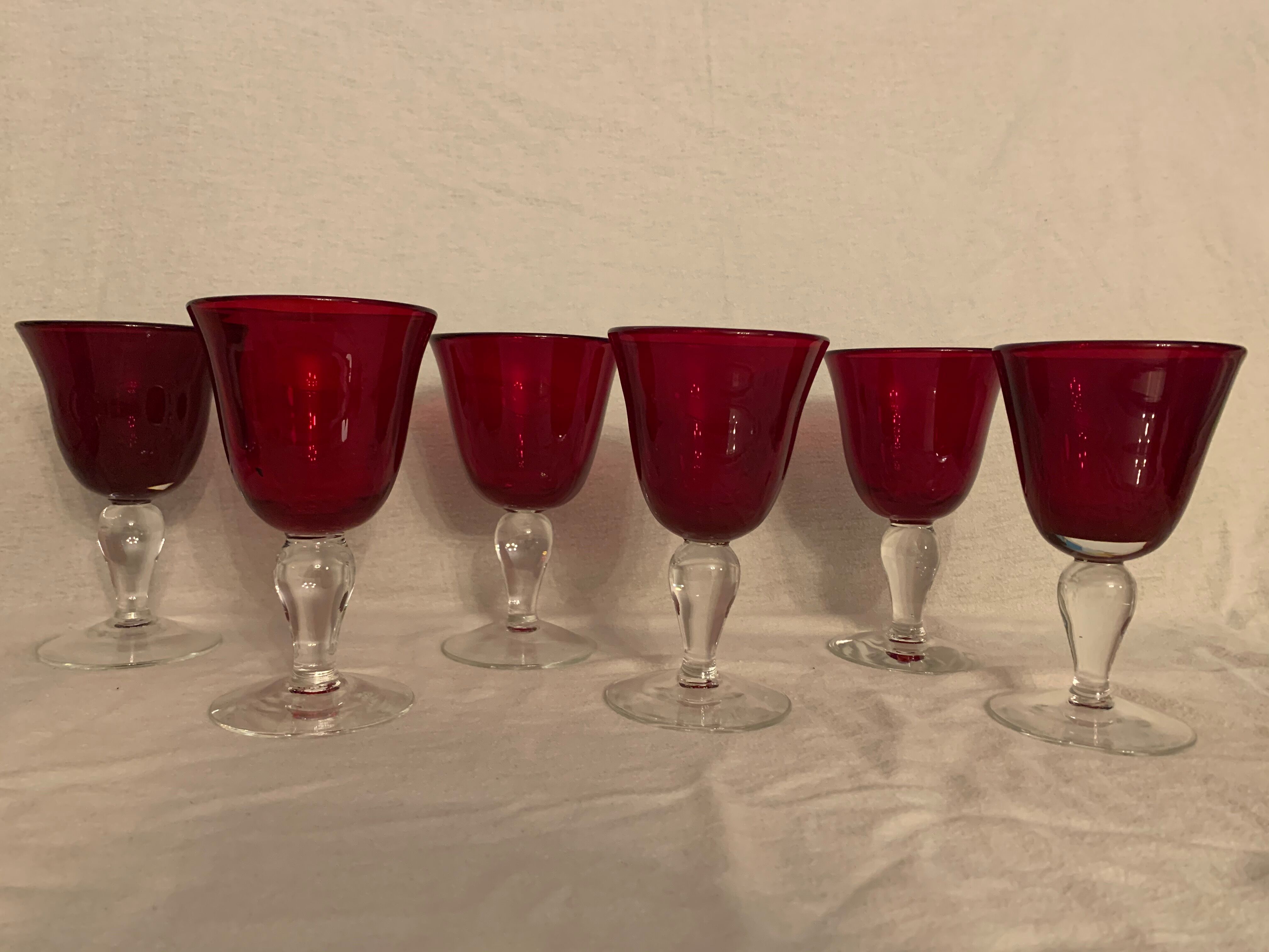 6 red bubbled puffed glasses on foot