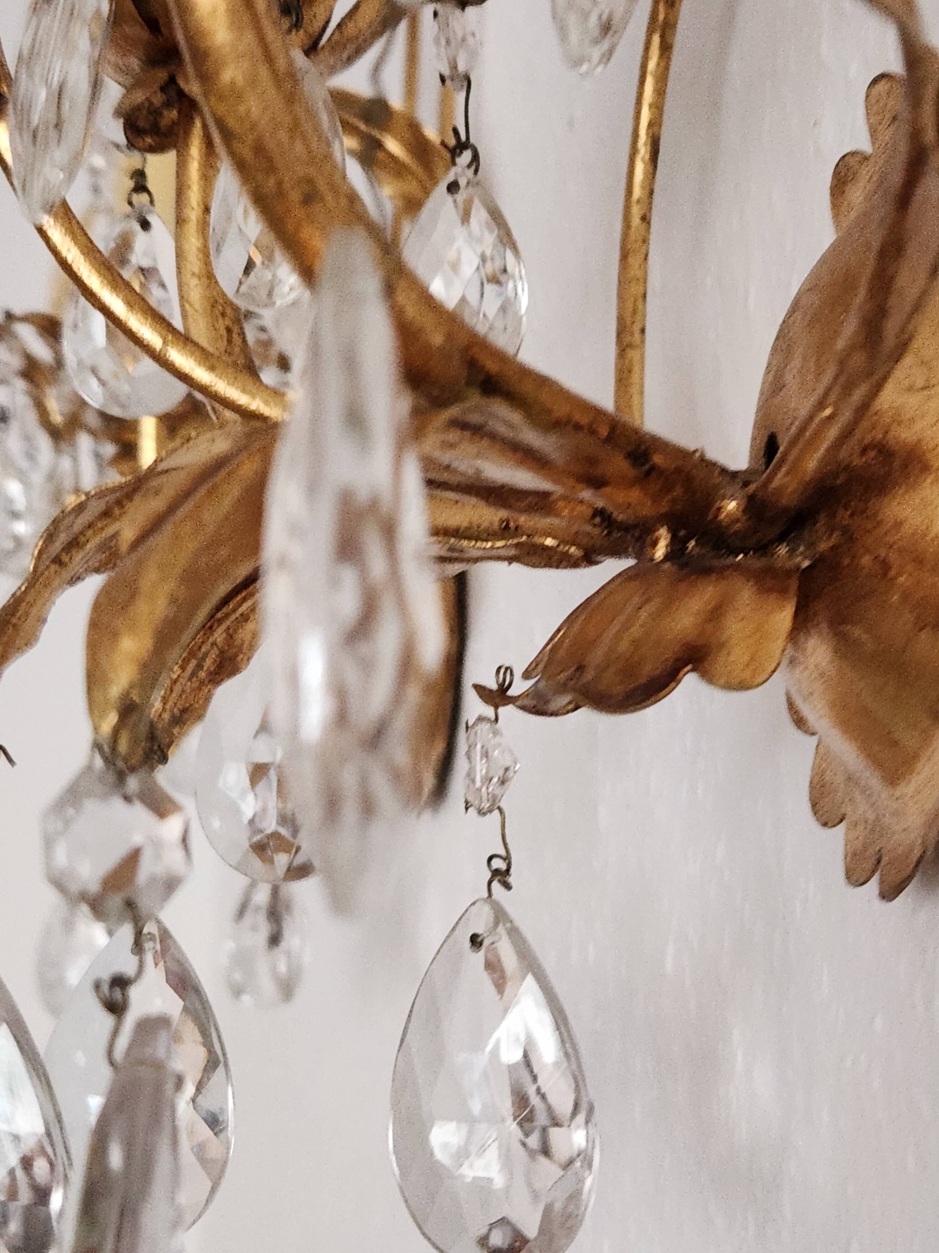 Hand-forged wall lamp gilded with gold leaf and crystals, Italy