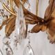 Hand-forged wall lamp gilded with gold leaf and crystals, Italy