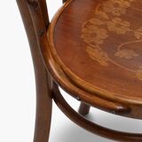 Bent wood chair with floral motif