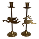 Pair of brass Christmas angel and reindeer candle holders