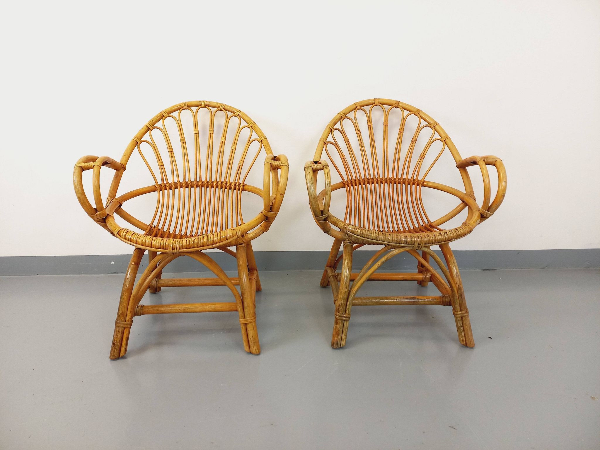 Pair of vintage rattan armchairs from the 60s