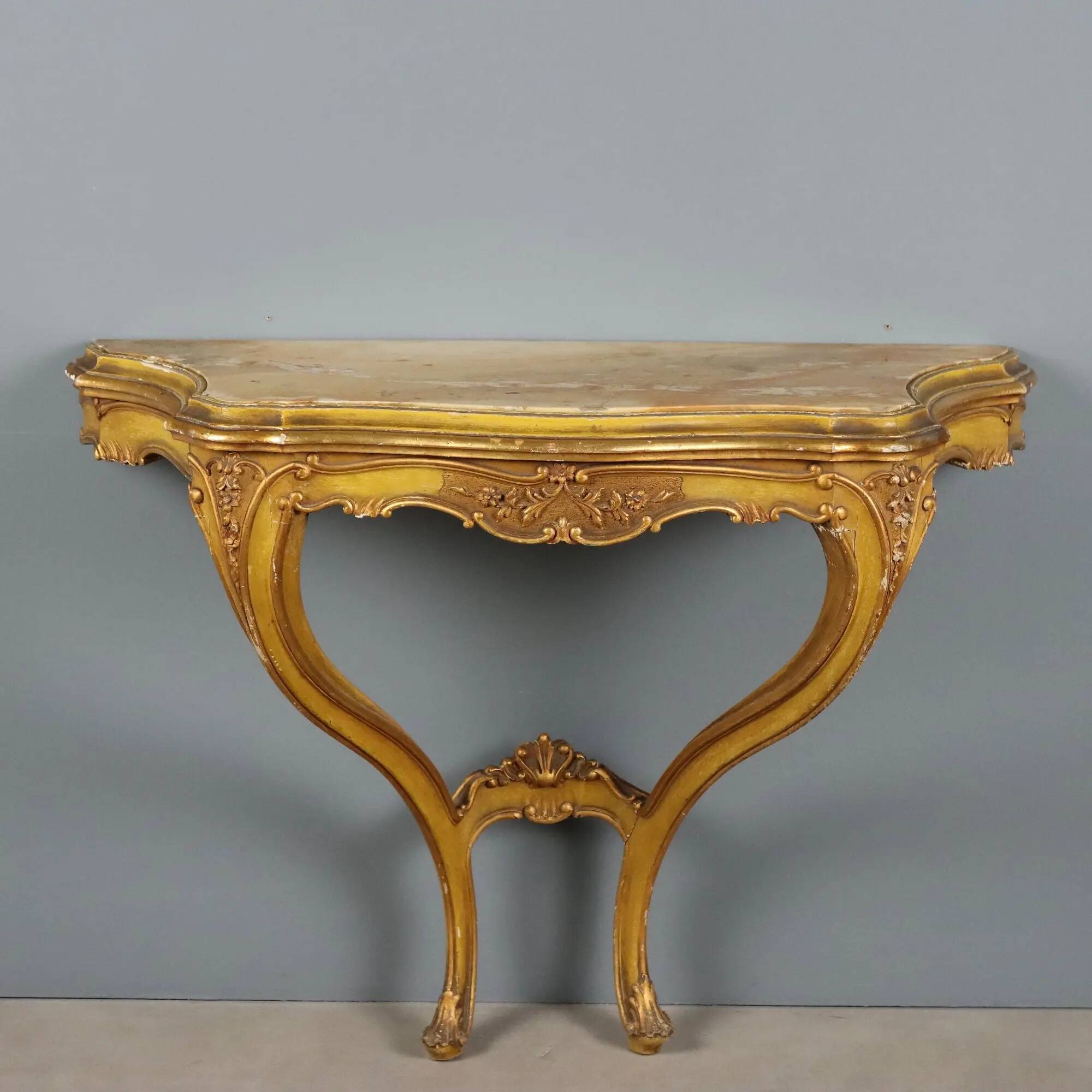 Antique console in carved gilded wood and marble, Italy, 19th century.