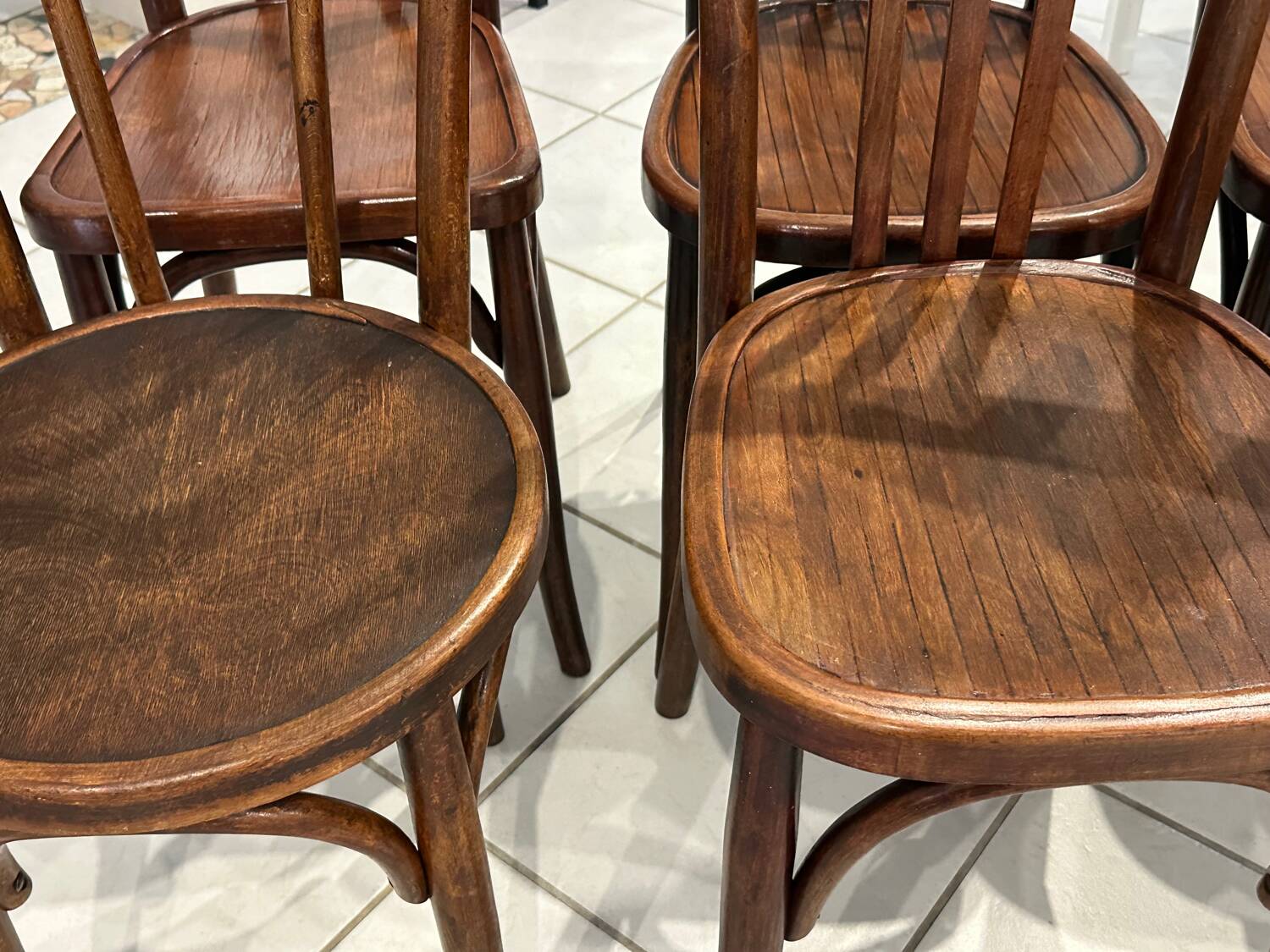 Set of 12 mismatched bistro chairs Baumann & Fischel 1930