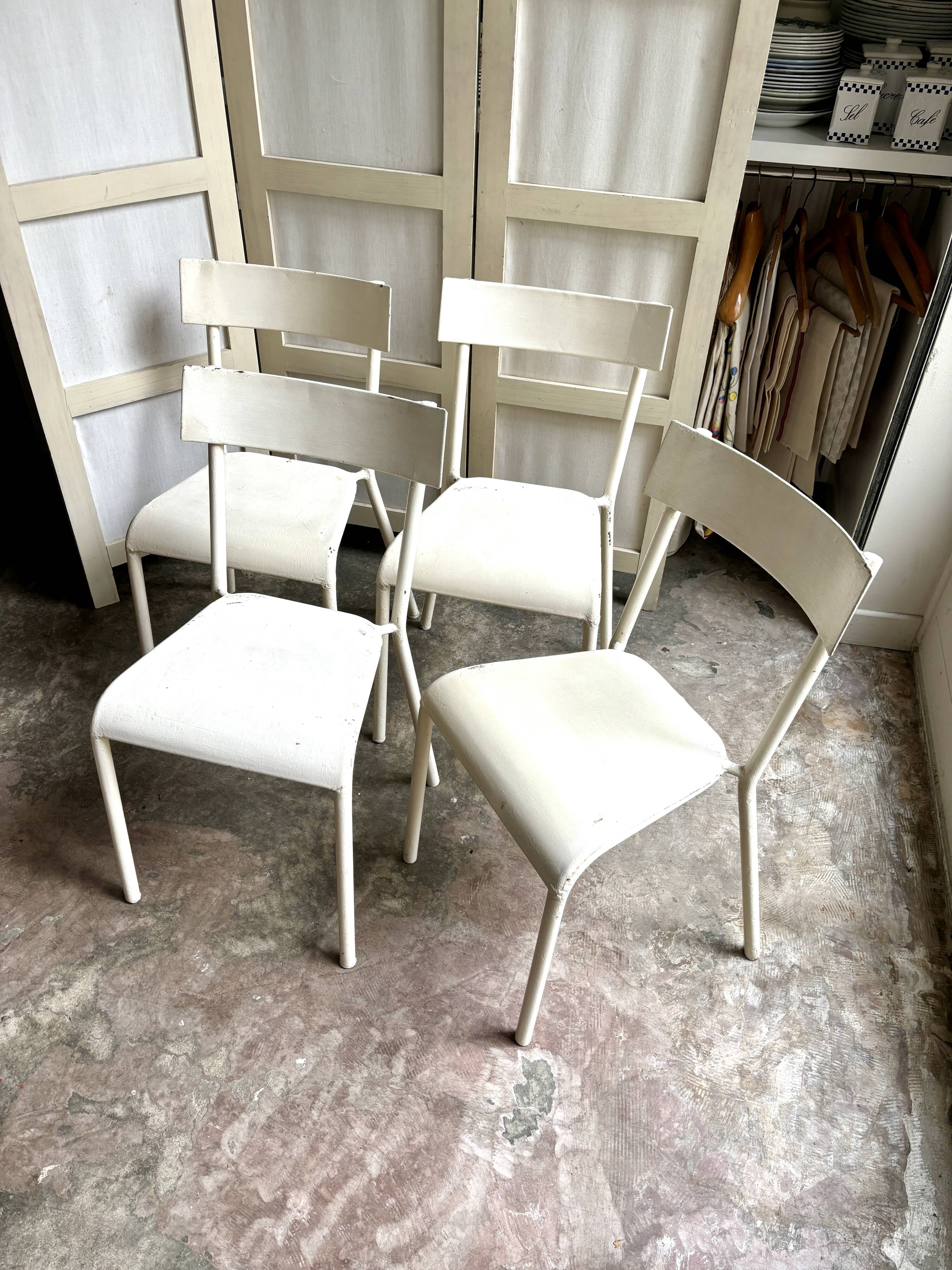 4 beige metal garden chairs