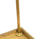 Old brass umbrella door triangular base mounted on column