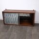 Small glass-fronted wall cabinet in teak with drawers, Denmark, 1960.