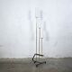 Vintage floor lamp in black metal, brass and opaline