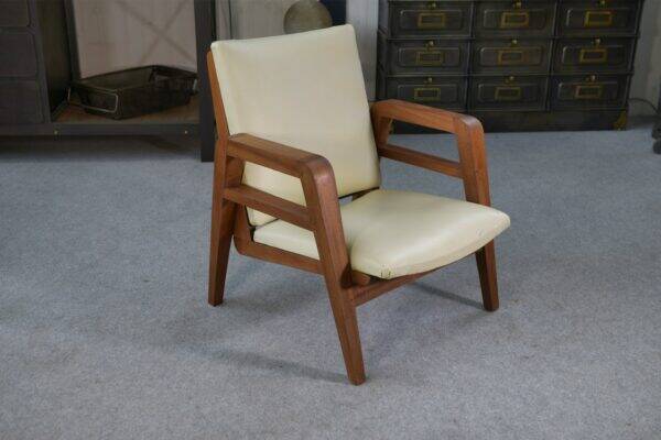 Modernist armchair in mahogany and skai 1940-1950