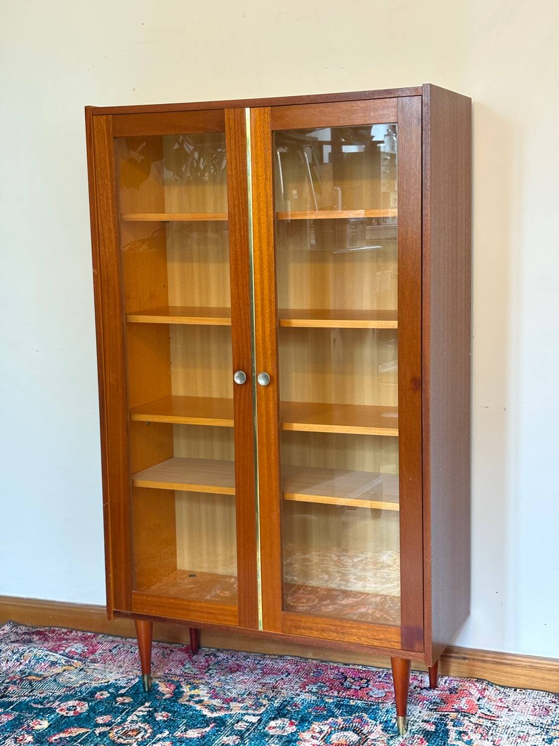 70s glass-fronted bookcase