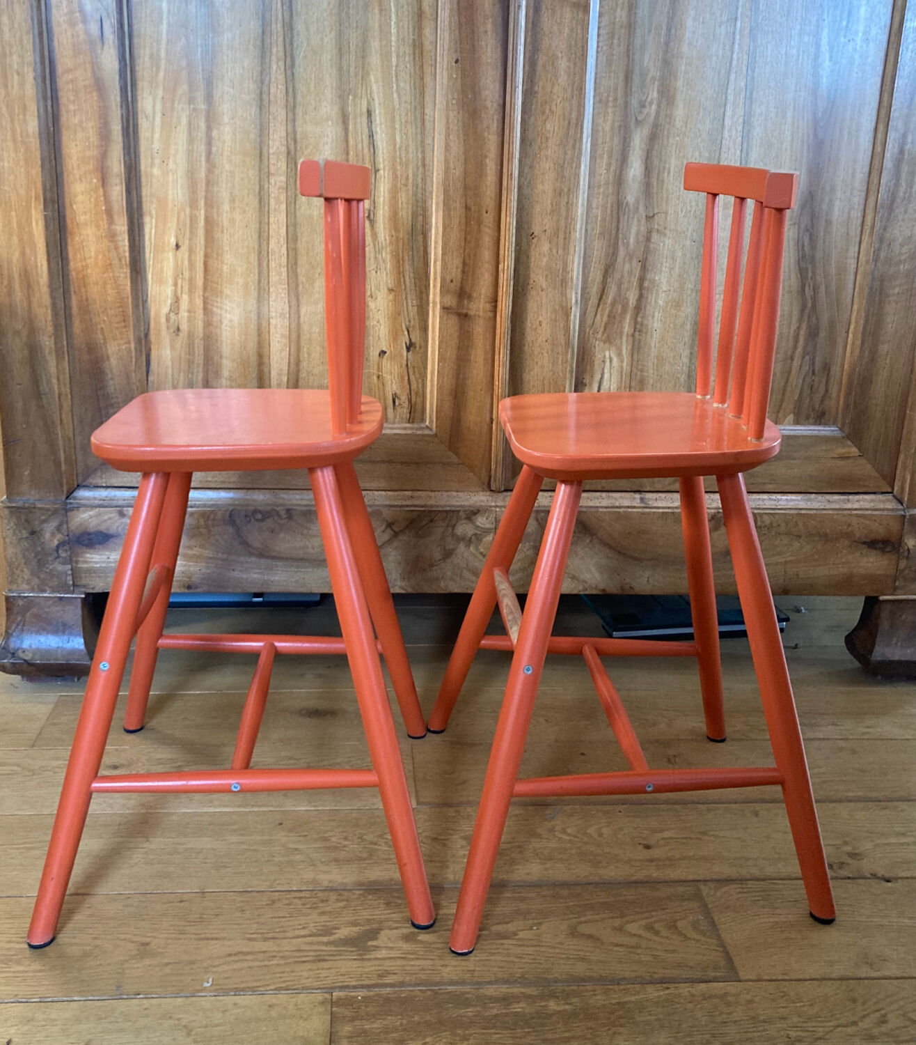 Vintage solid wood high chairs in Western style for children.