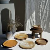 Set of 4 vintage stoneware plates, including 2 with floral motifs