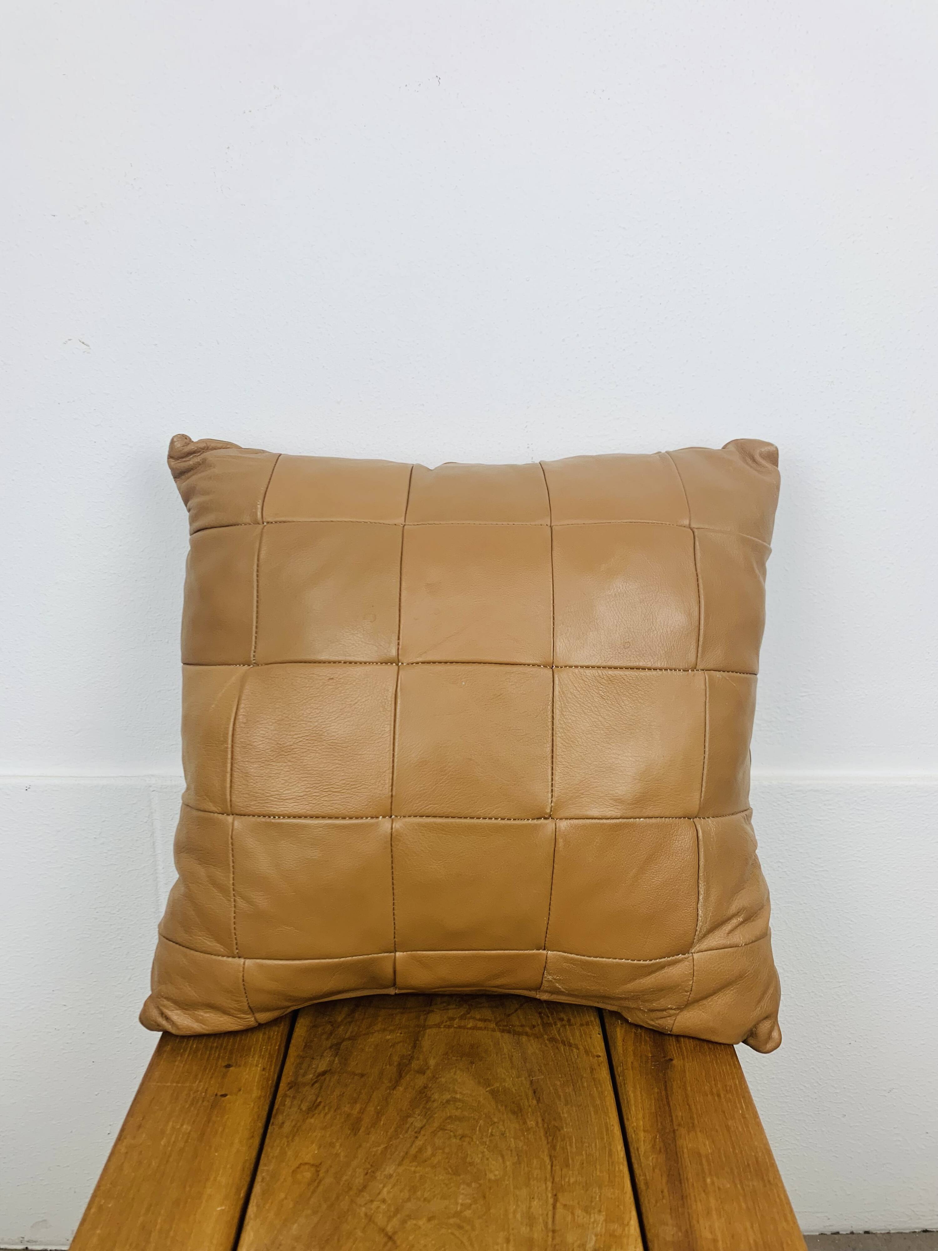 Vintage patchwork leather cushion