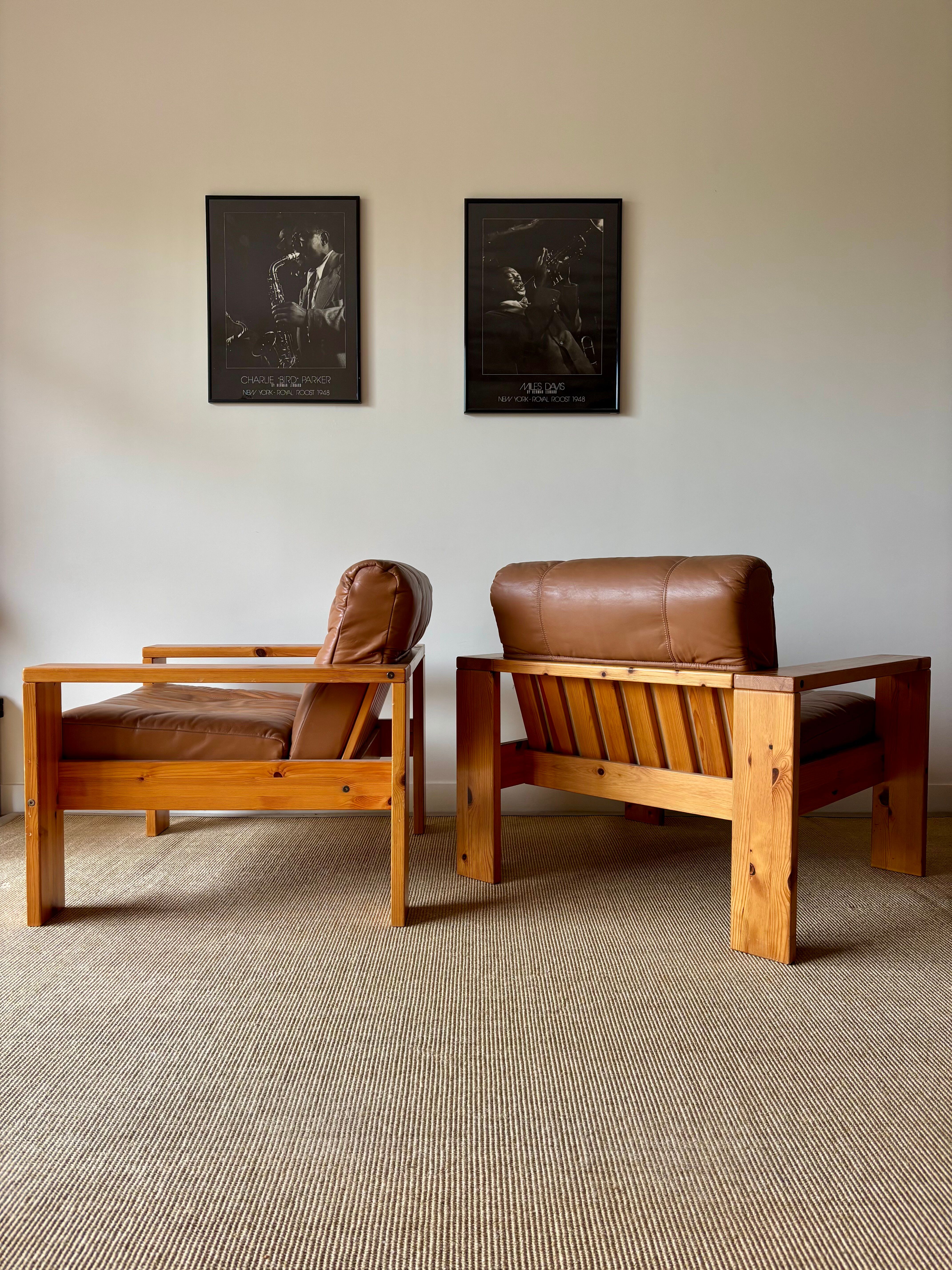2 pine and leather armchairs from the 1970s
