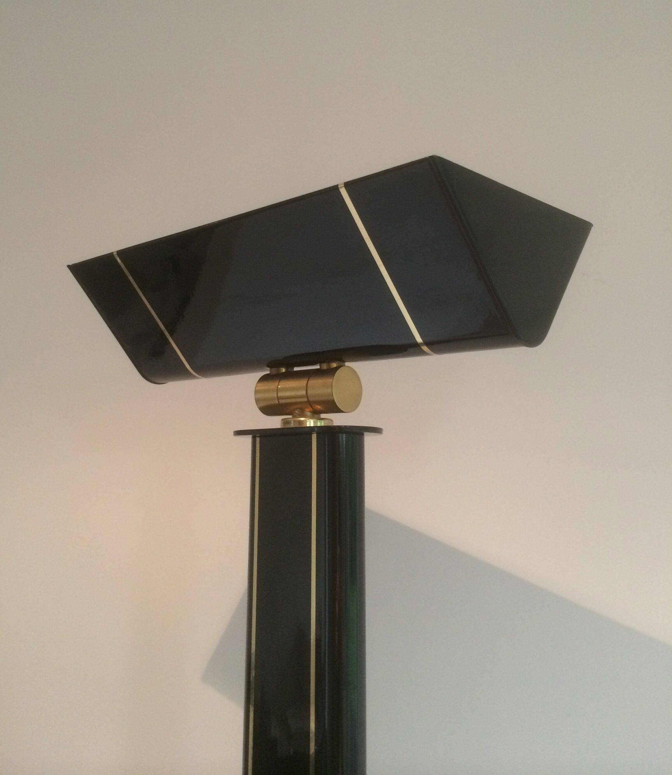 Black lacquered and brass floor lamp