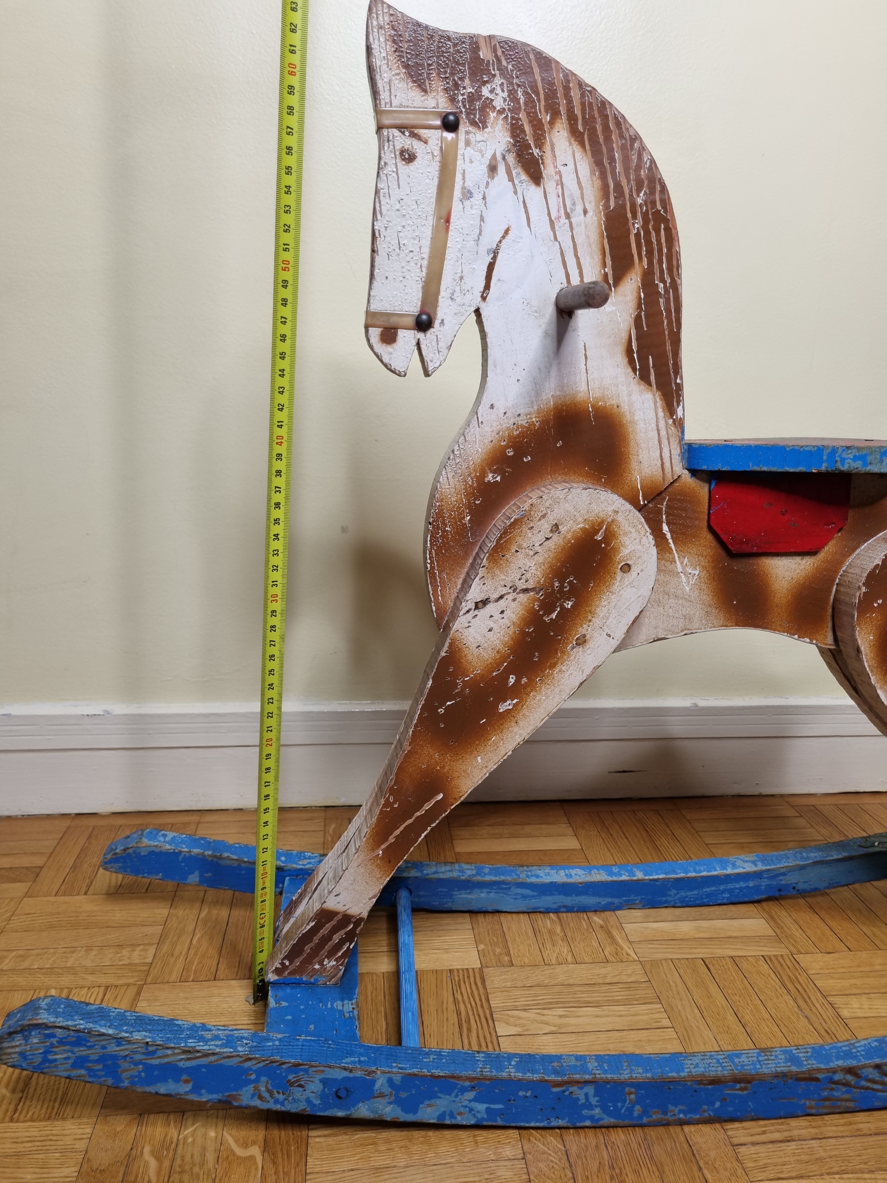 Old rocking horse in painted wood, 50s